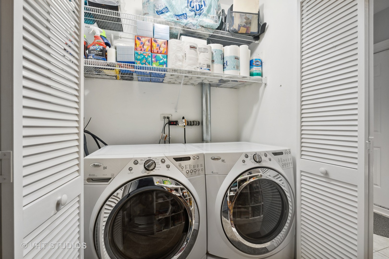 2128 West Walton Street, Unit 1E Chicago, IL 60622 - Photo 19 of 23 a utility room with dryer and washer