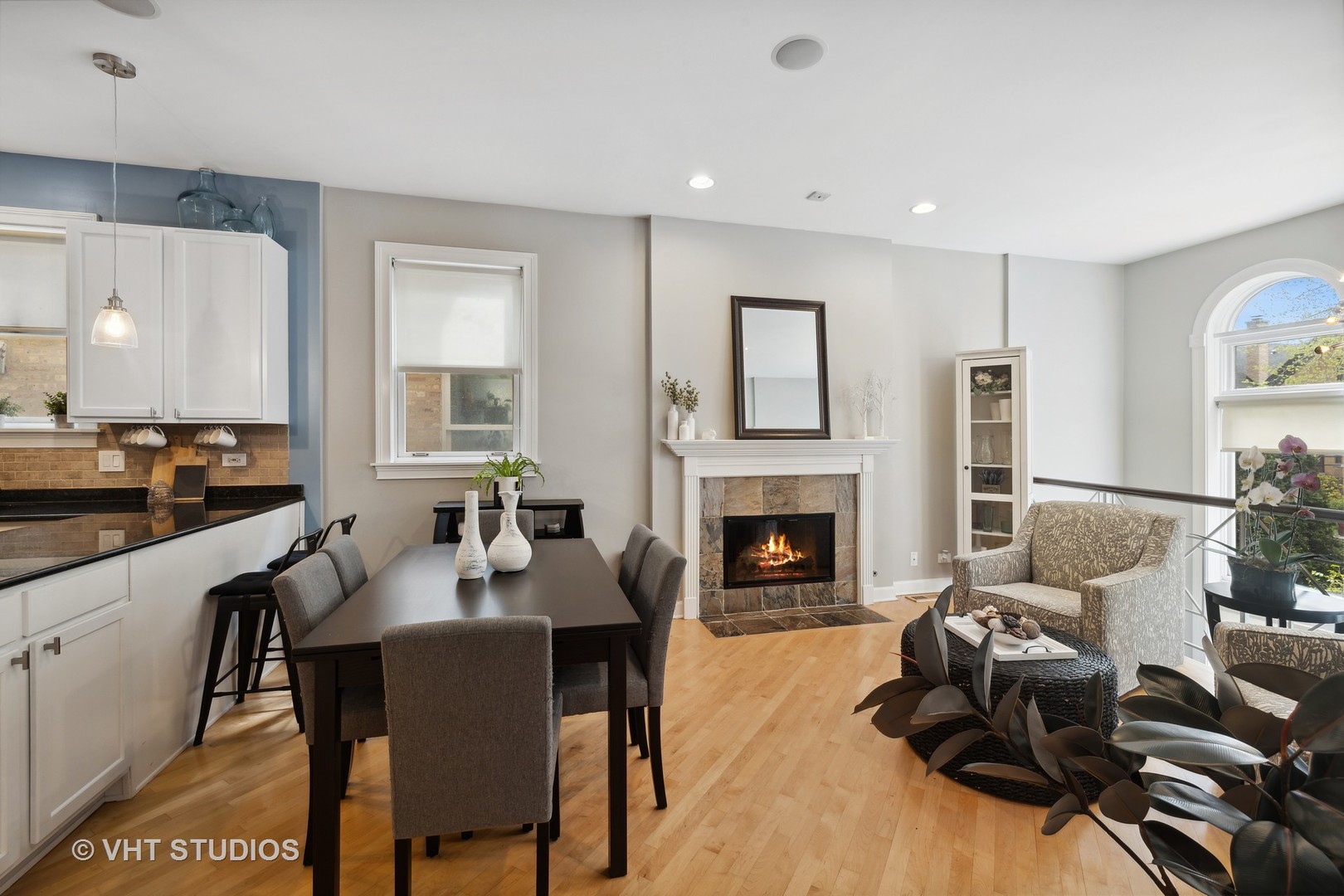 2128 West Walton Street, Unit 1E Chicago, IL 60622 - Photo 3 of 23 a living room with furniture and a fireplace