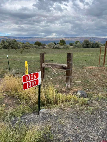 a view of a street with an ocean view