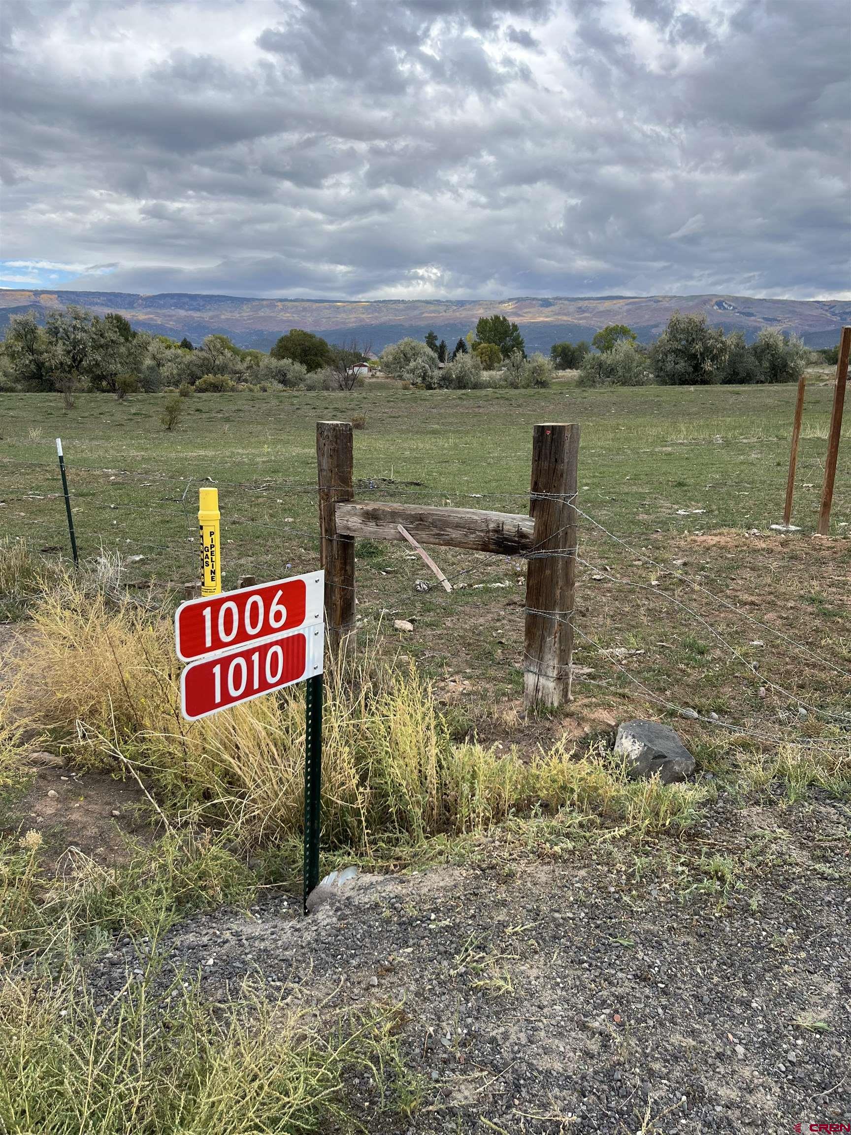 a view of a street with an ocean view
