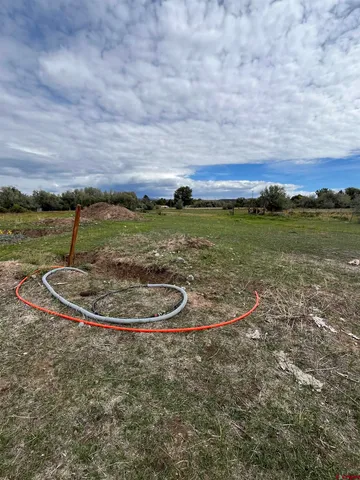 a view of a lake with a big yard