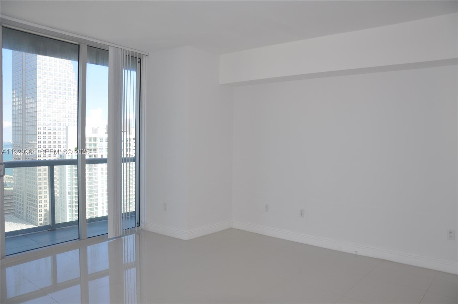 475 Brickell Avenue, Unit 4215 Miami, FL 33131 - Photo 5 of 17 a view of an empty room with a window