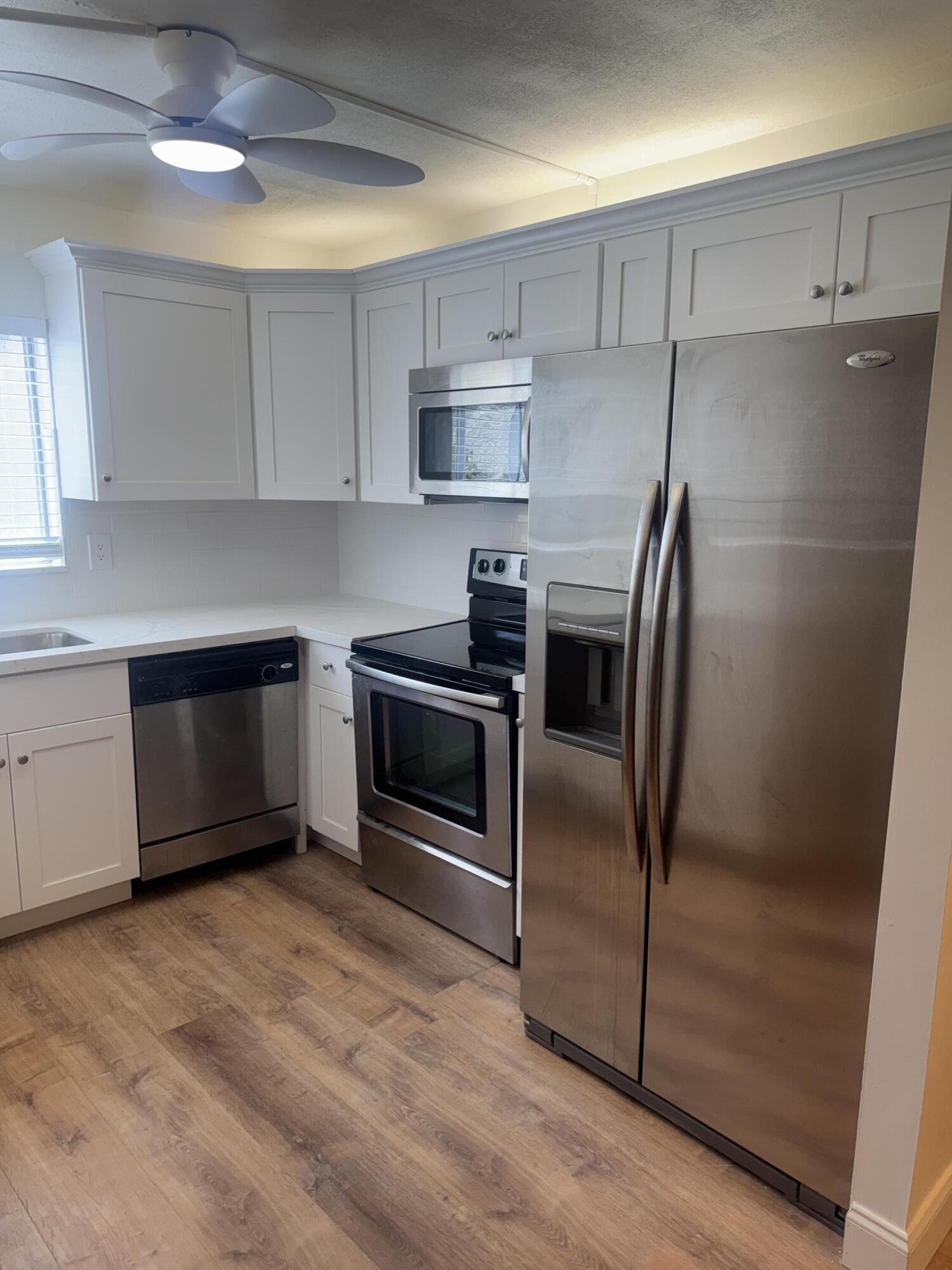 1444 Southeast Riverside Drive, Unit B7 Stuart, FL 34996 - Photo 3 of 29 IMG_3023 3