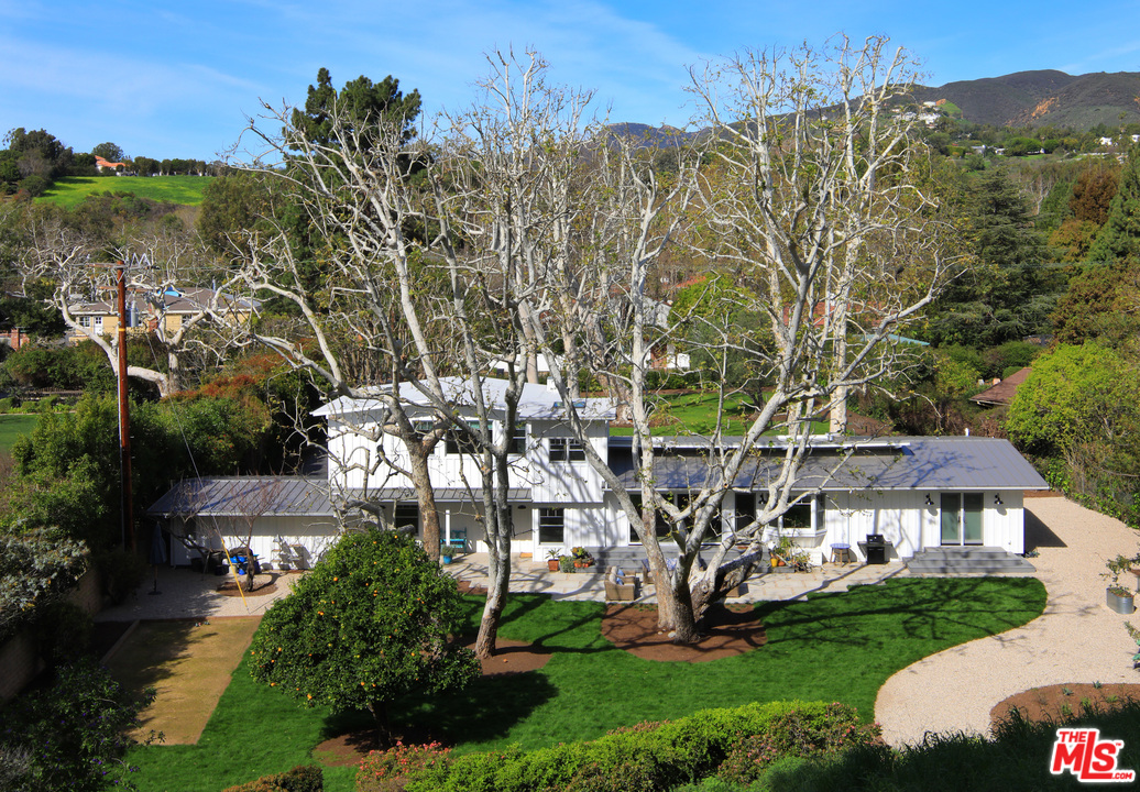 6152 Bonsall Drive Malibu, CA 90265 - Photo 23 of 26 a view of a building with a garden