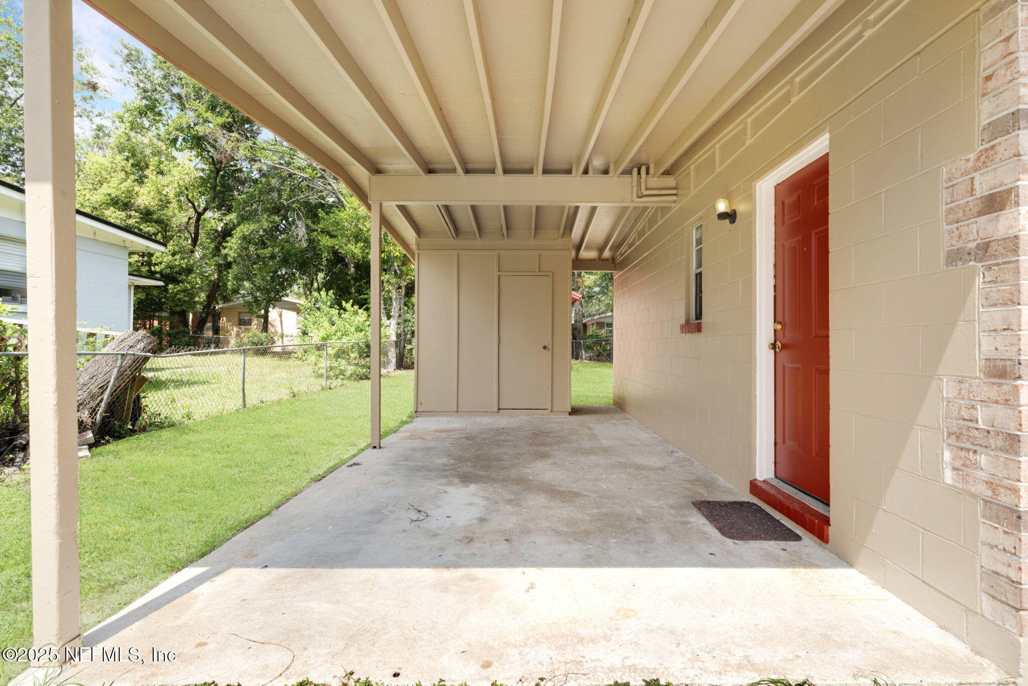2254 Firestone Road Jacksonville, FL 32210 - Photo 17 of 20 a view of a porch