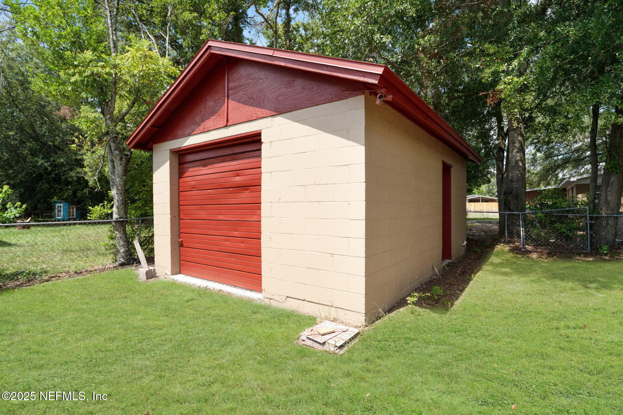 2254 Firestone Road Jacksonville, FL 32210 - Photo 18 of 20 a view of back yard of the house