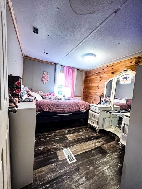 205 County Road 179 Decatur, TN 37322 - Photo 15 of 20 a room with a bed and wooden floor