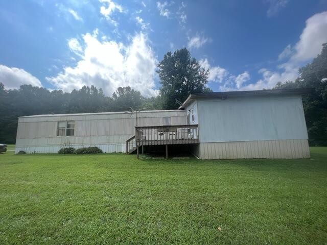 205 County Road 179 Decatur, TN 37322 - Photo 2 of 20 a view of a couches in a backyard of the house