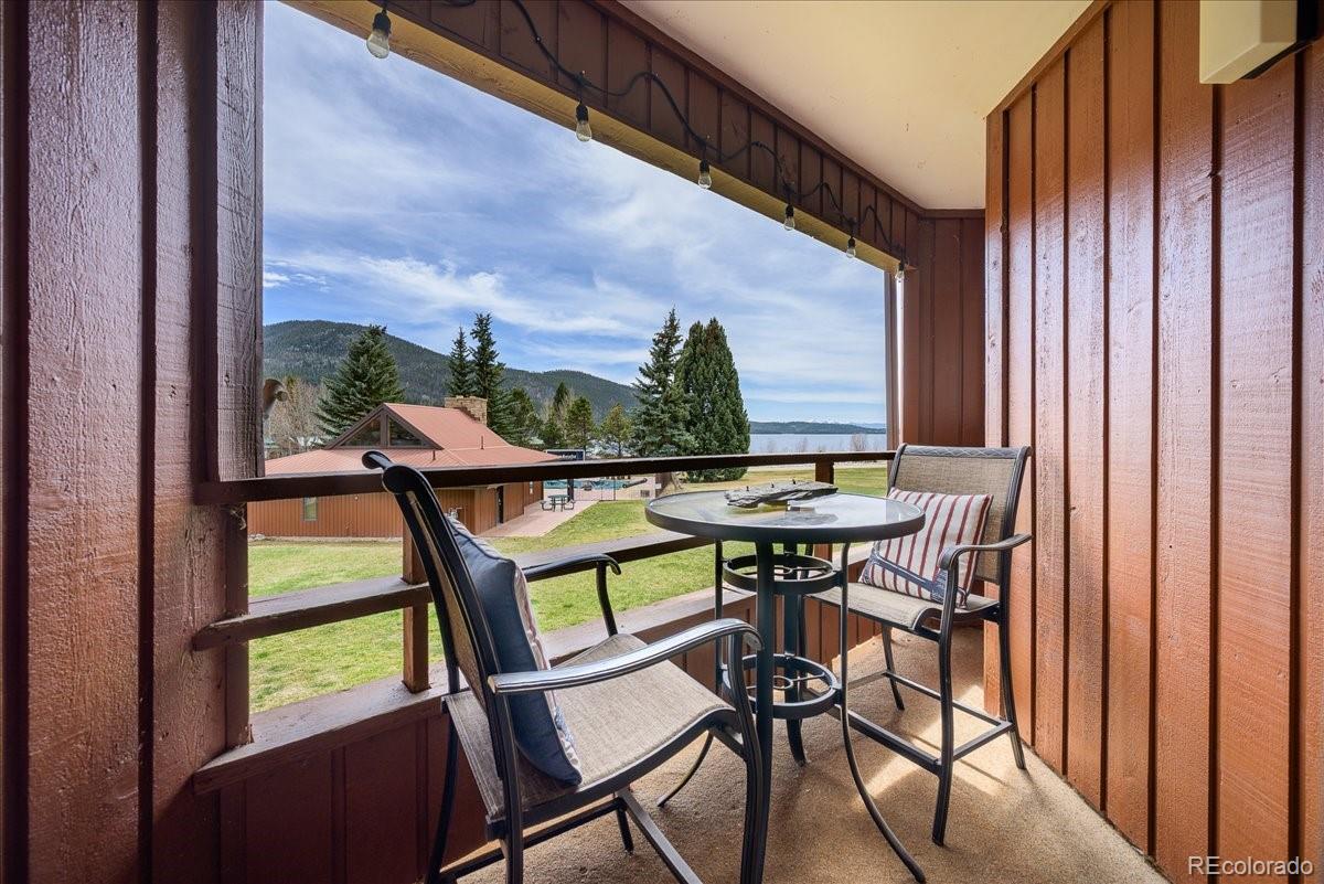 605 Lake Front Road, Unit 8 Grand Lake, CO 80447 - Photo 17 of 30 a view of a chairs and table in the balcony