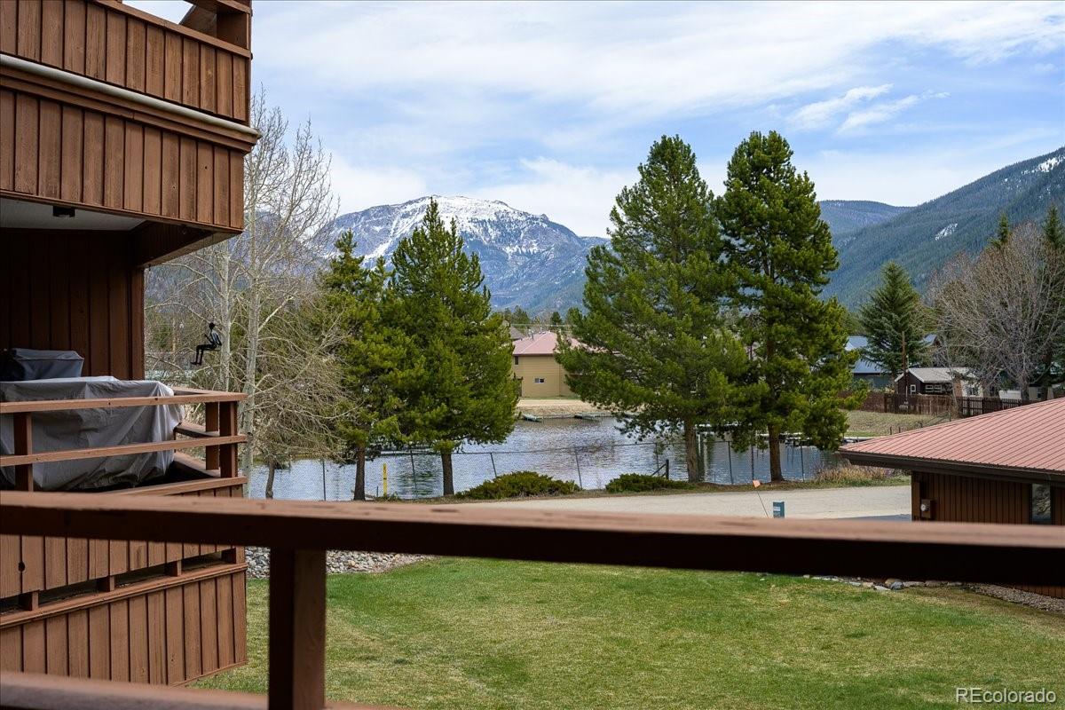 605 Lake Front Road, Unit 8 Grand Lake, CO 80447 - Photo 18 of 30 a view of balcony with two plants and a lake view
