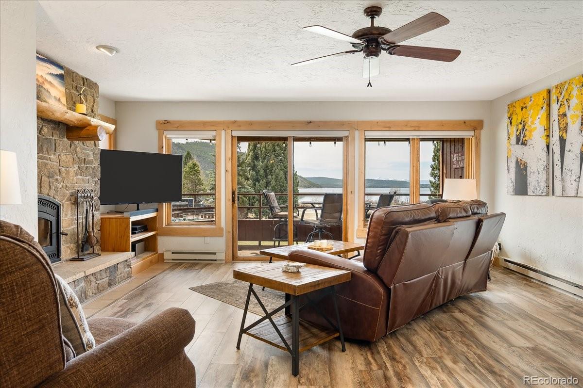 605 Lake Front Road, Unit 8 Grand Lake, CO 80447 - Photo 7 of 30 a living room with furniture and a flat screen tv