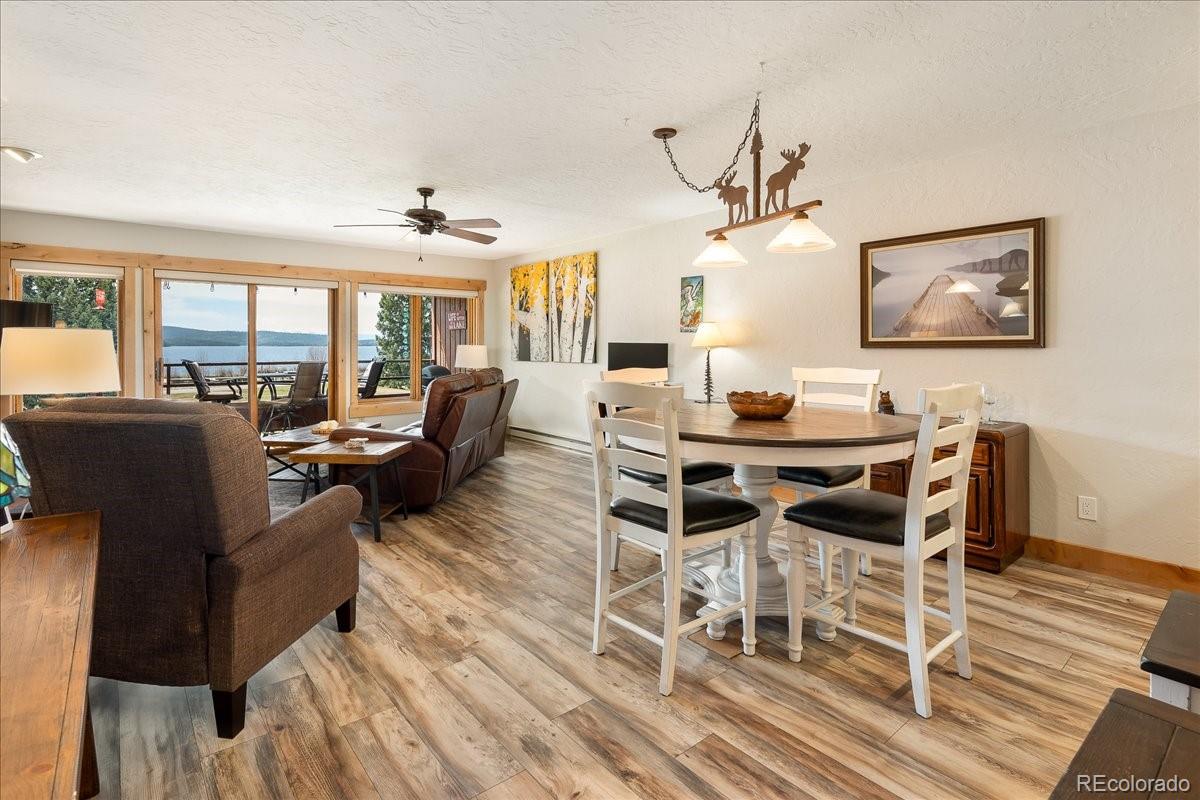 605 Lake Front Road, Unit 8 Grand Lake, CO 80447 - Photo 10 of 30 a view of a dining room with furniture window and wooden floor