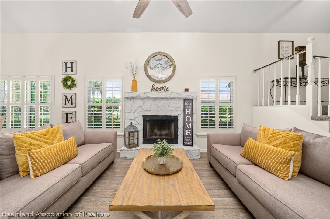 3103 Duffer Road Sebring, FL 33872 - Photo 11 of 29 a living room with furniture and a fireplace