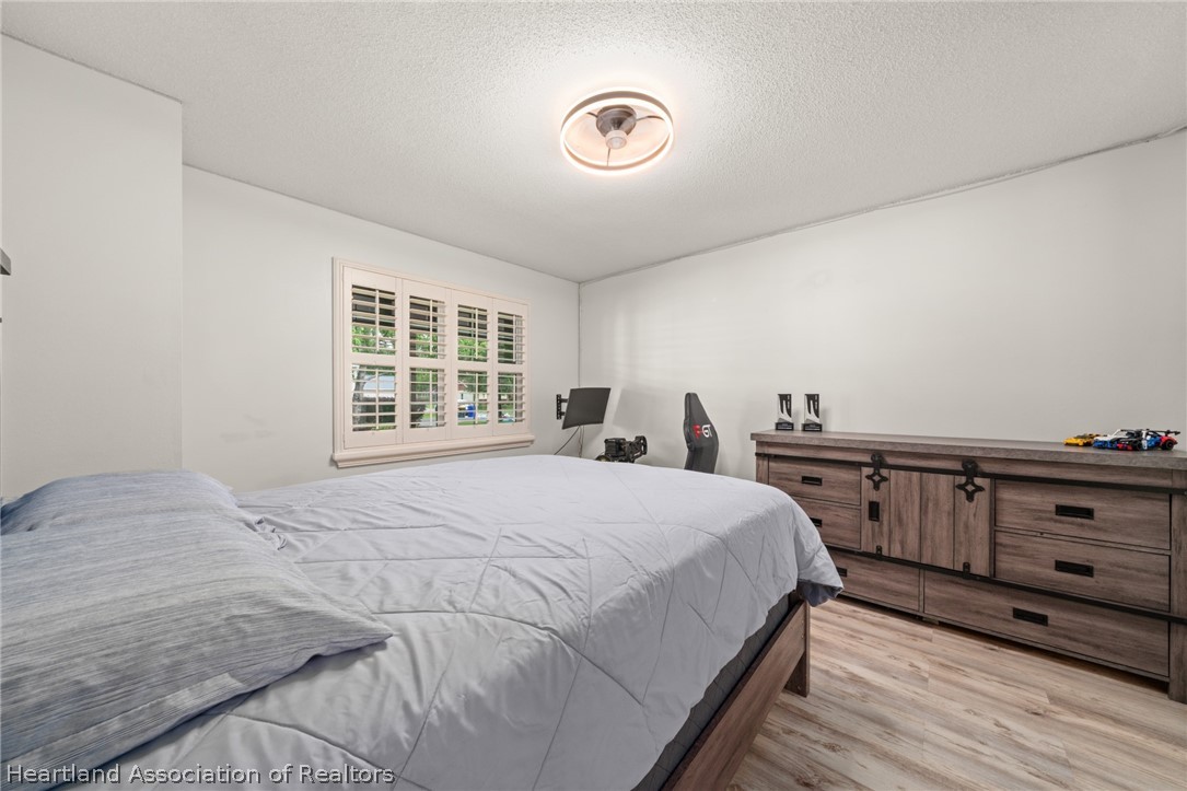 3103 Duffer Road Sebring, FL 33872 - Photo 16 of 29 a bedroom with a bed and a window
