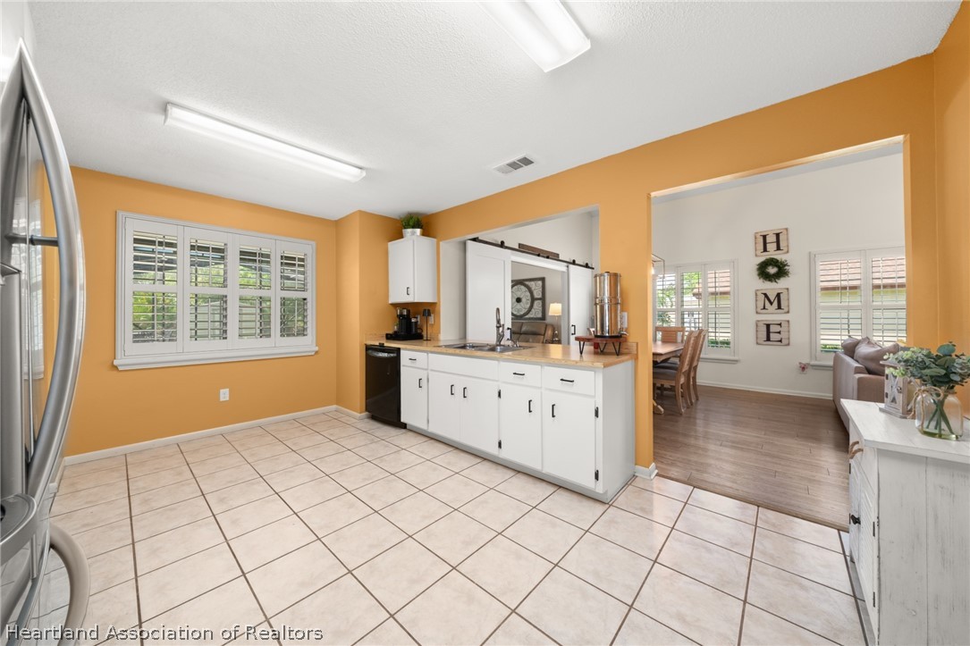 3103 Duffer Road Sebring, FL 33872 - Photo 4 of 29 a view of a kitchen with furniture and windows