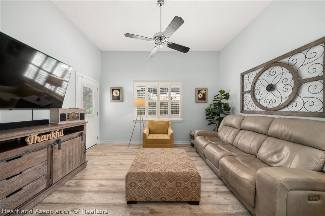 3103 Duffer Road Sebring, FL 33872 - Photo 8 of 29 a living room with furniture and a flat screen tv