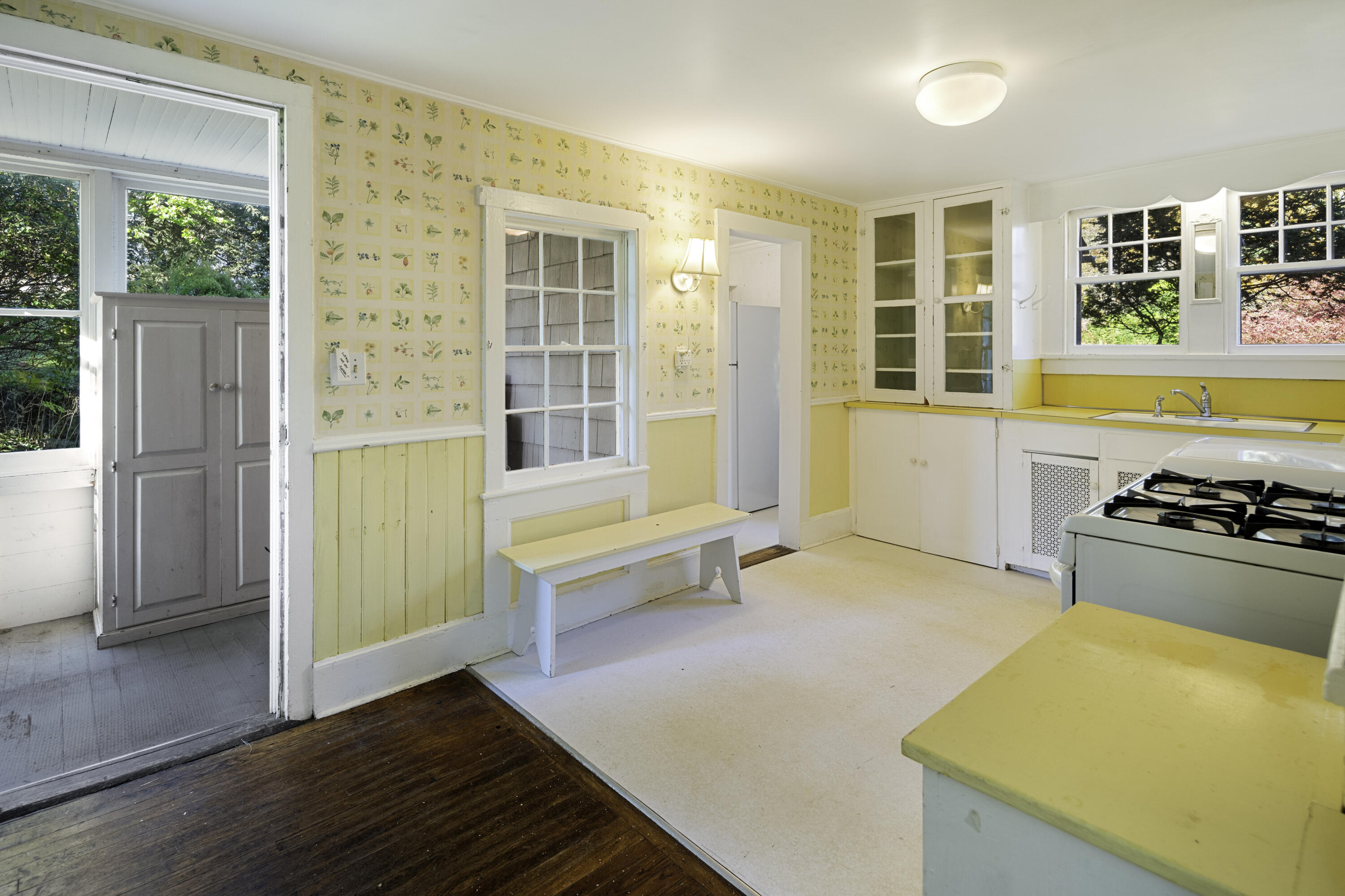 40 Ogden Road New Canaan, CT 06840 - Photo 11 of 35 a large kitchen with a large window and a counter top space