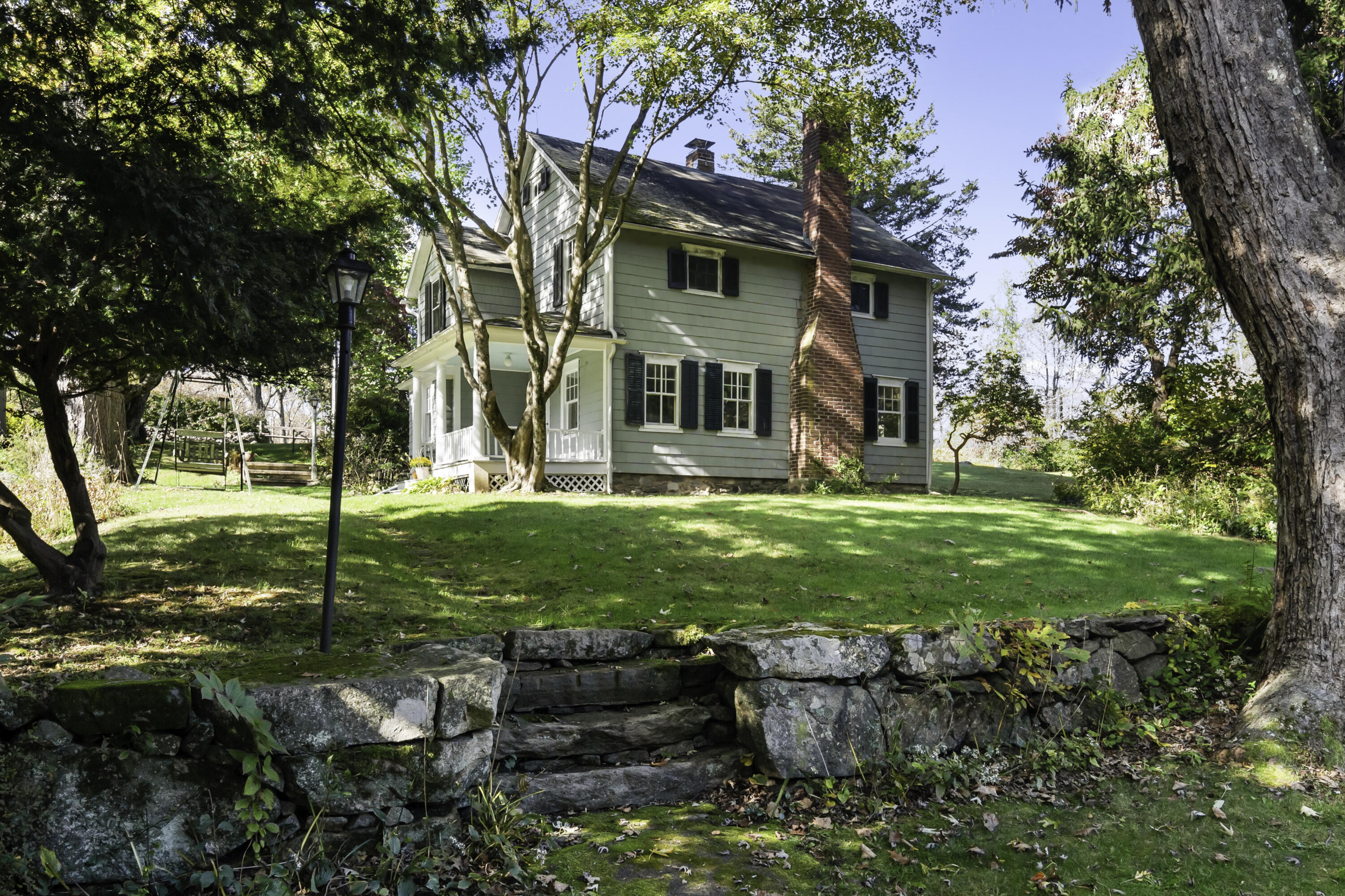 40 Ogden Road New Canaan, CT 06840 - Photo 5 of 35 a view of a house with backyard