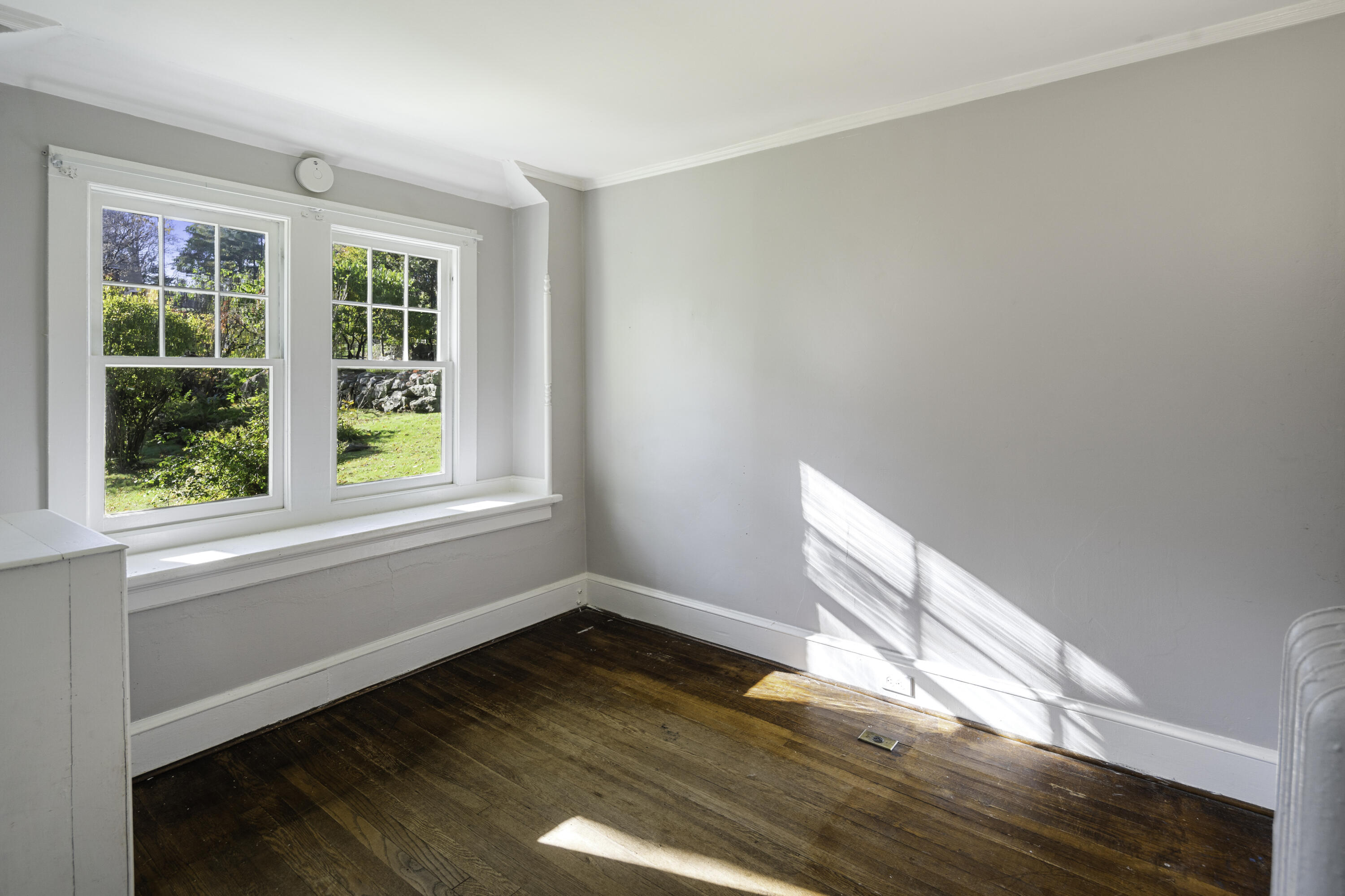 40 Ogden Road New Canaan, CT 06840 - Photo 8 of 35 a view of empty room with wooden floor and fan