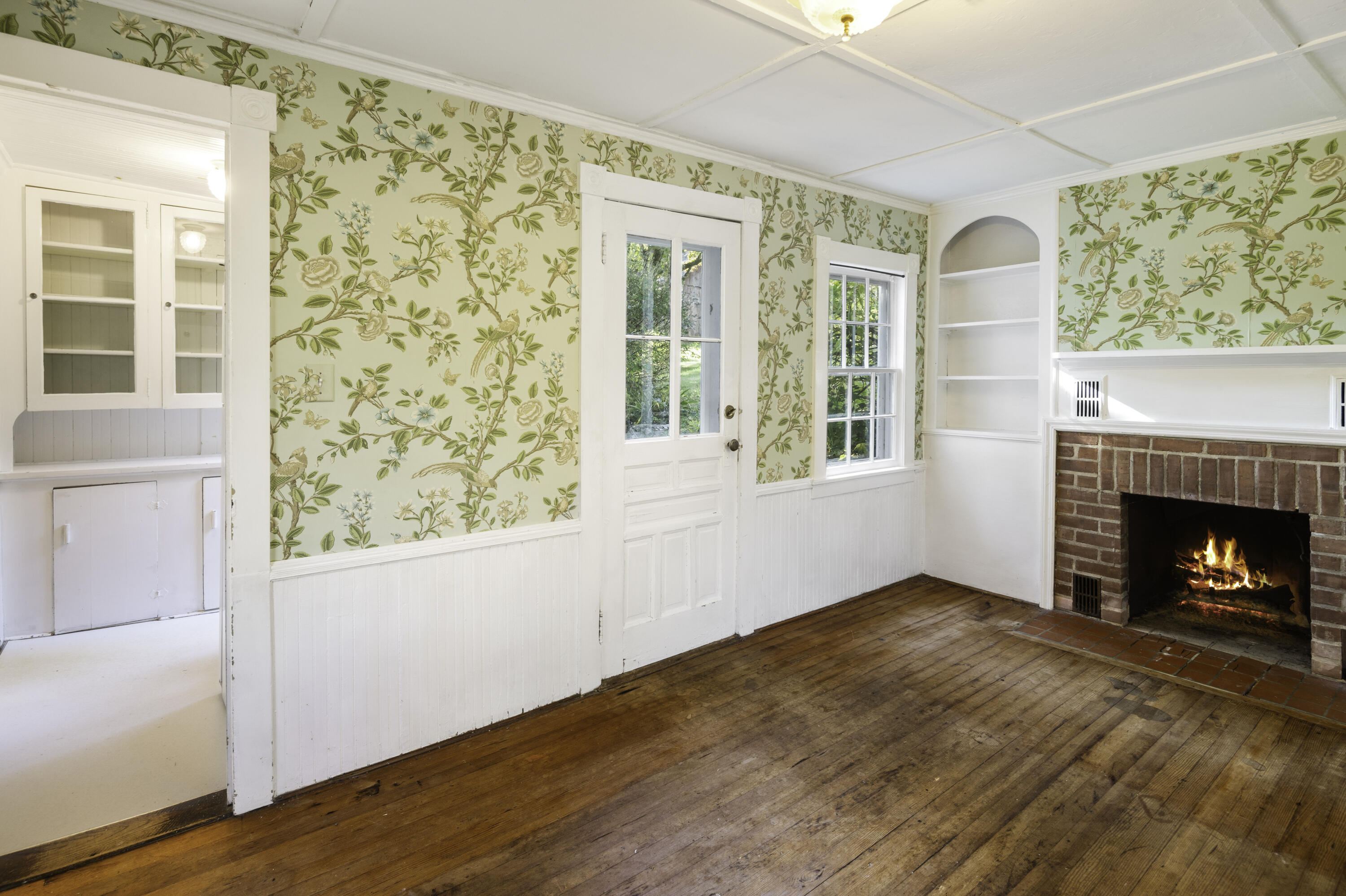 40 Ogden Road New Canaan, CT 06840 - Photo 9 of 35 a view of an empty room with wooden floor and a window
