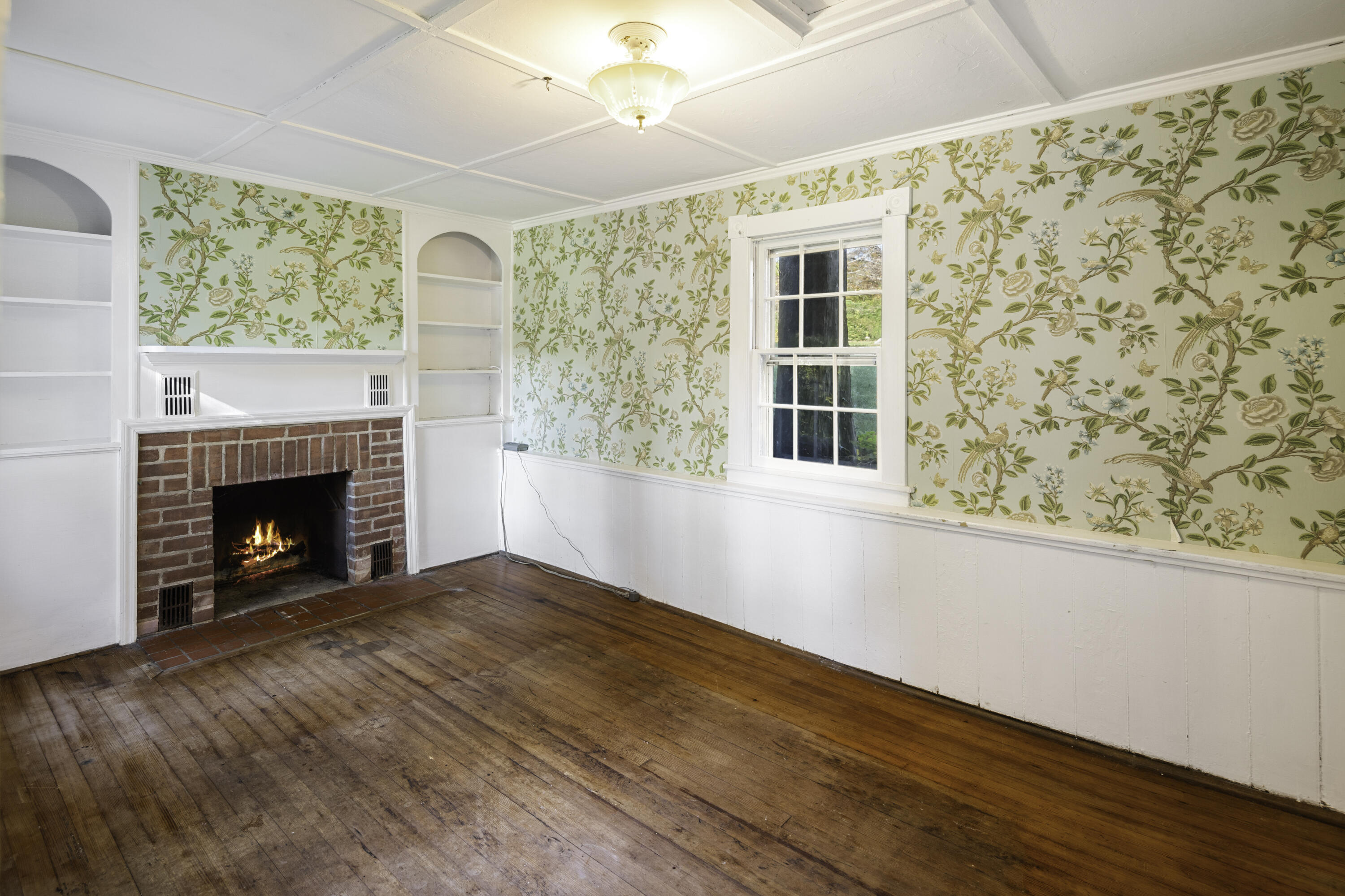 40 Ogden Road New Canaan, CT 06840 - Photo 10 of 35 a view of an empty room with wooden floor and a window