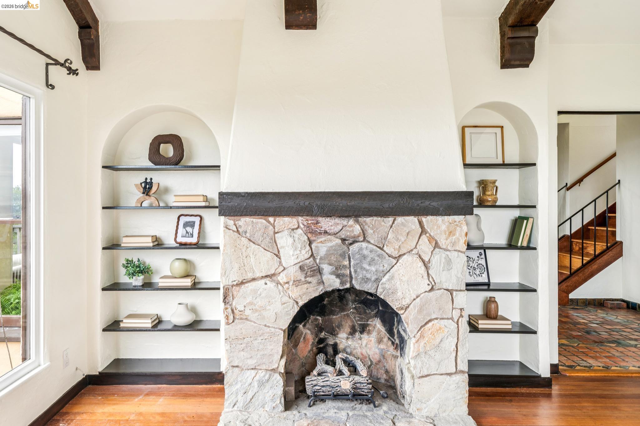 784 Cragmont Avenue Berkeley, CA 94708 - Photo 22 of 64 Stone-clad fireplace featuring an arched firebox