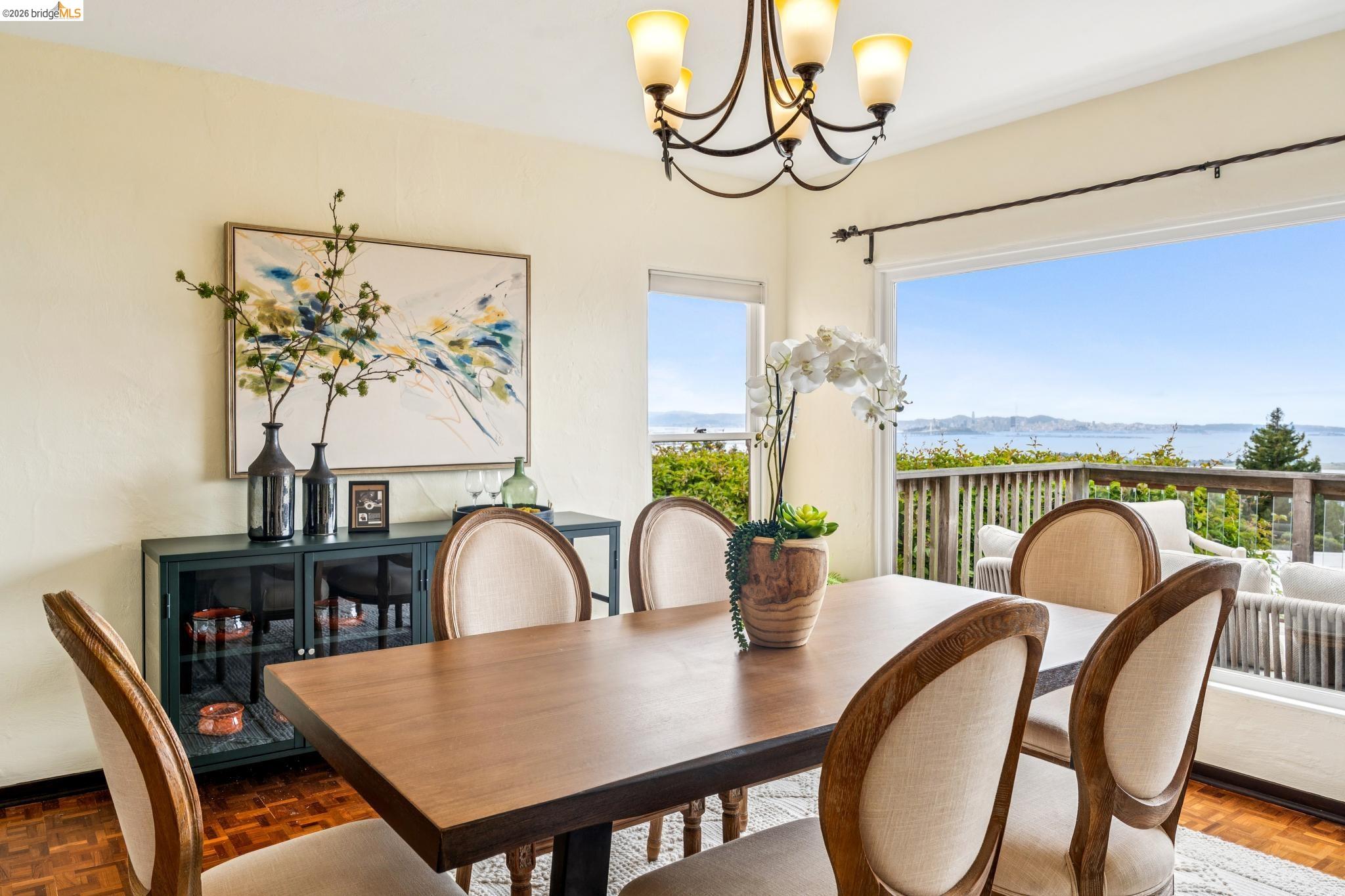 784 Cragmont Avenue Berkeley, CA 94708 - Photo 26 of 64 Dining area featuring expansive window framing distant water and city elements