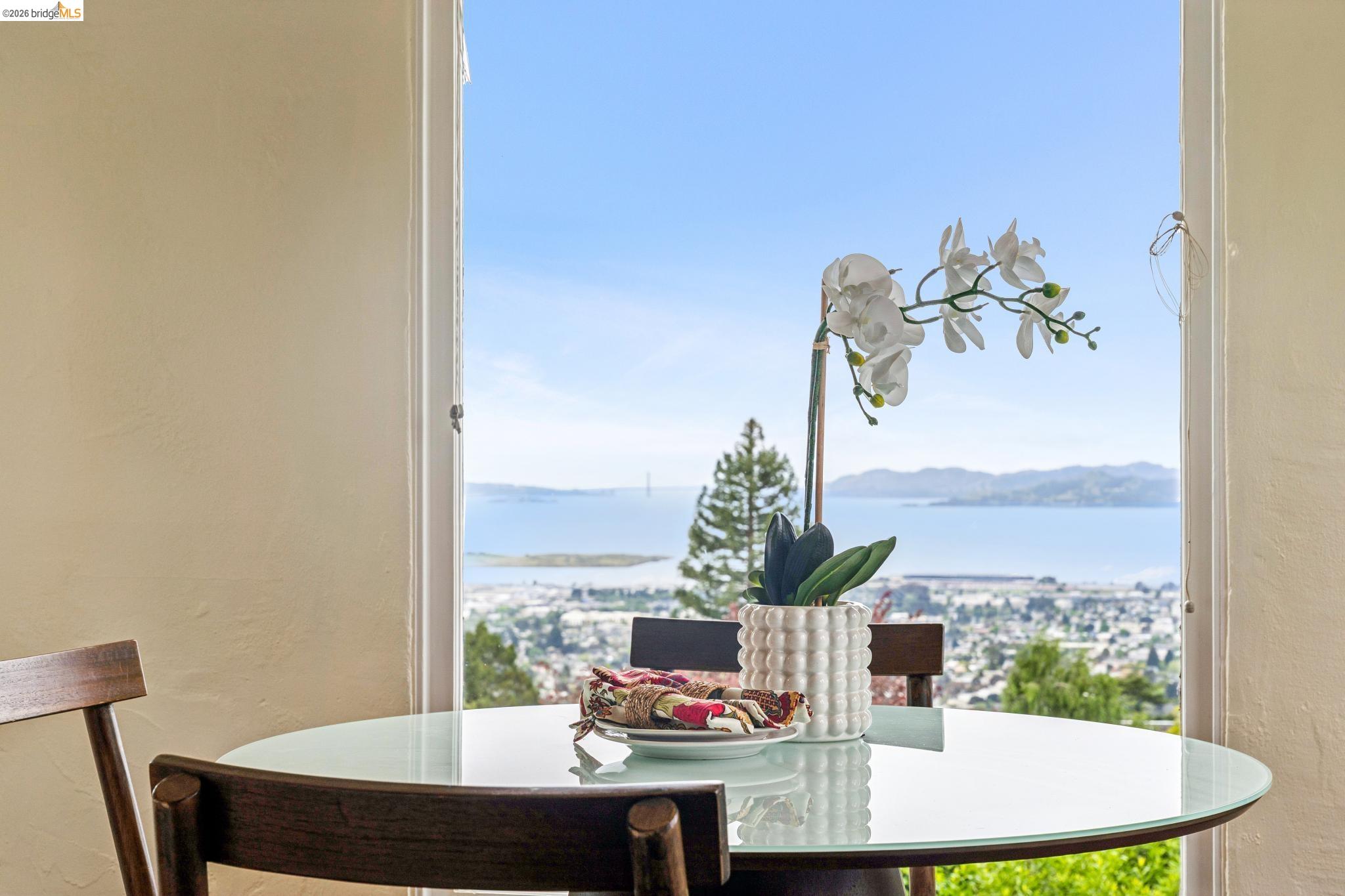 784 Cragmont Avenue Berkeley, CA 94708 - Photo 37 of 64 Expansive bay and city scenery framed by a bright window
