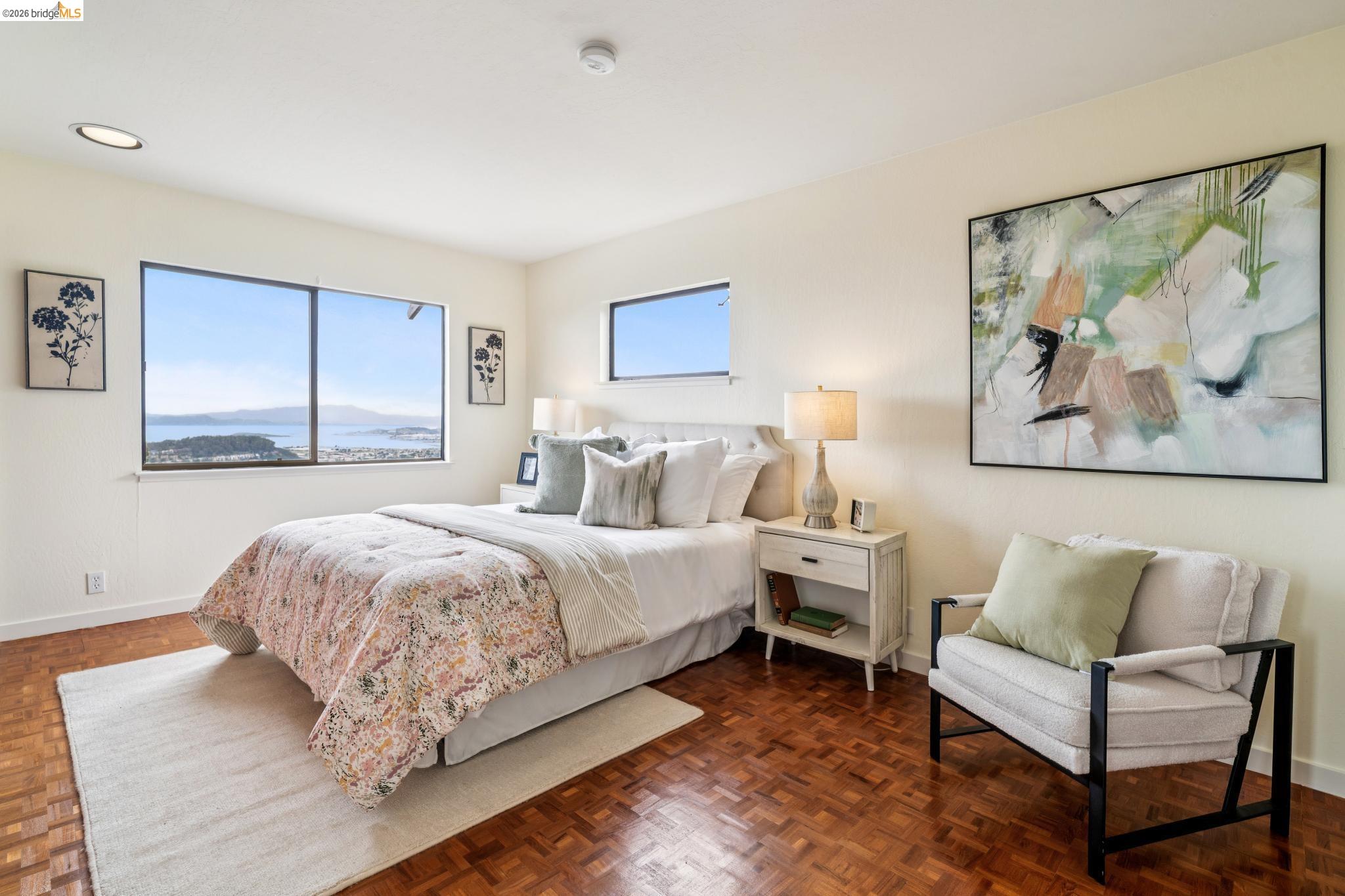 784 Cragmont Avenue Berkeley, CA 94708 - Photo 49 of 64 Room featuring wood-finish parquet flooring, multiple windows, recessed ceiling lighting, and light-toned wall finishes