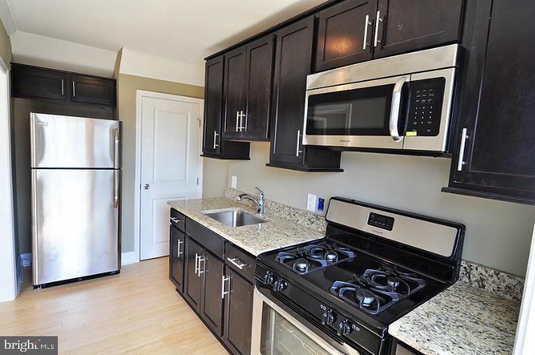 8511 Kavanagh Road Baltimore, MD 21222 - Photo 5 of 8 Older photo has new paintand floors