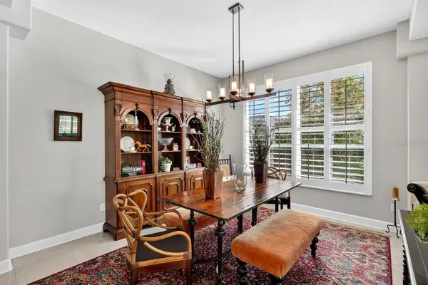 a bathroom with a tub a shower and a sink