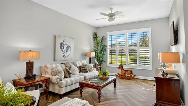 a spacious bathroom with a double vanity sink a large mirror and a shower