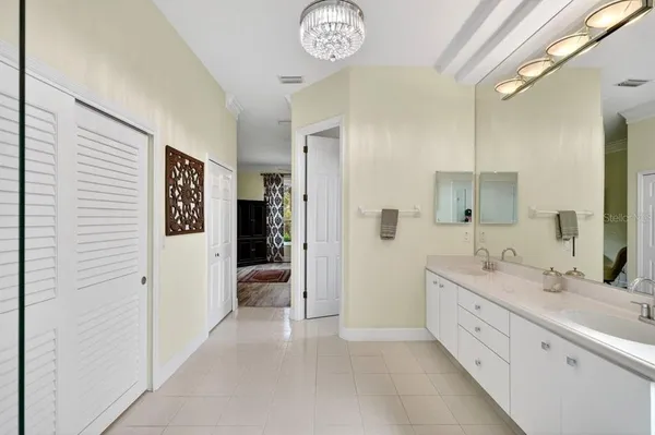 a living room with fireplace furniture and a large window