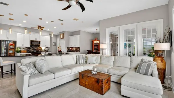 a view of a patio with a table and chairs