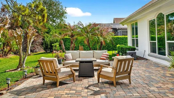 an aerial view of a house with a lake view