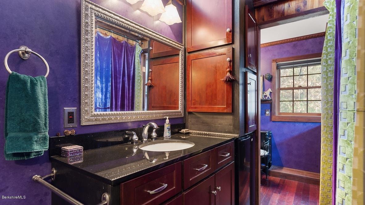 10 South Beech Plain Road Sandisfield, MA 01255 - Photo 23 of 48 a bathroom with a granite countertop sink and a mirror