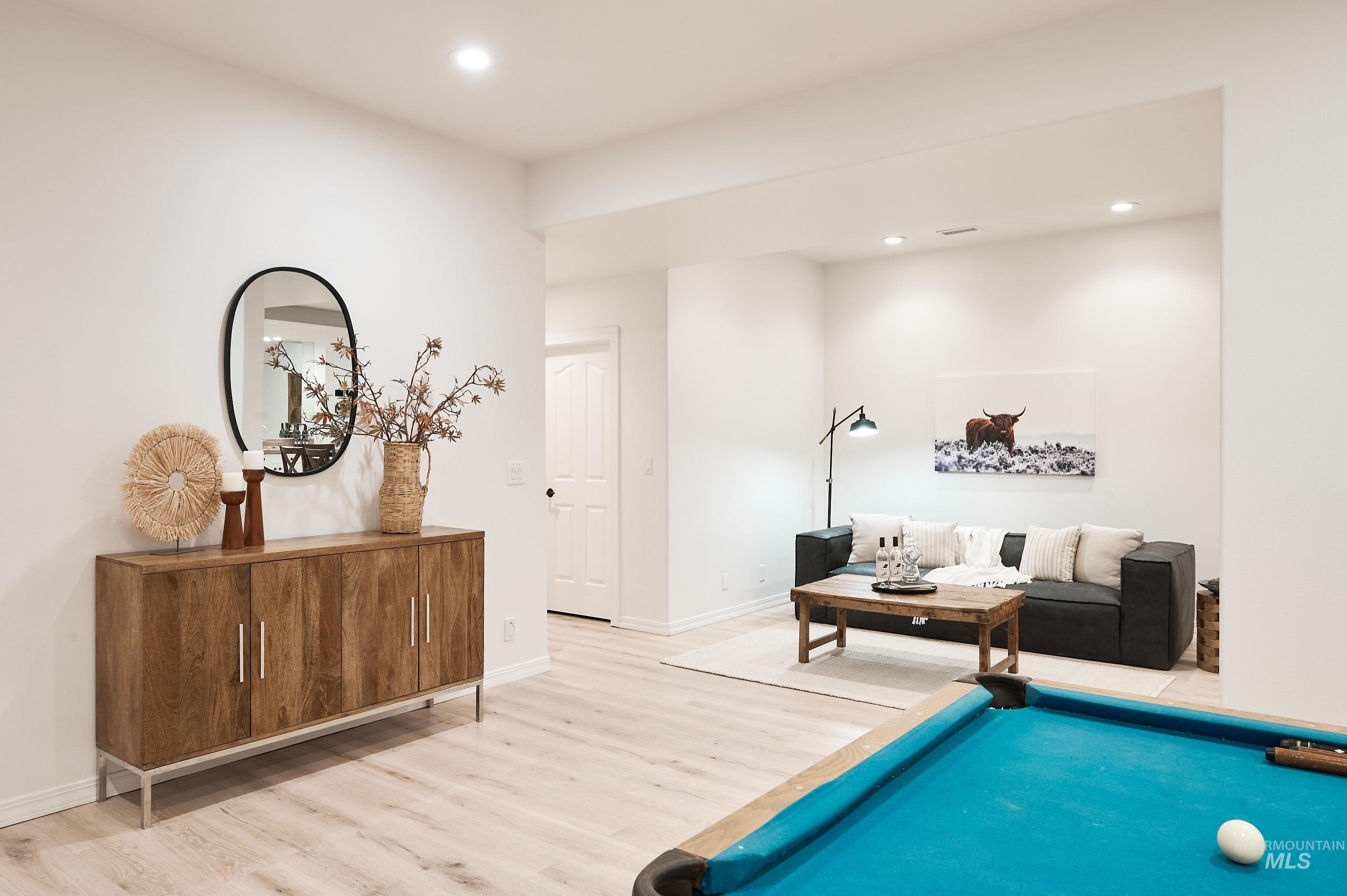3931 North Triple Ridge Place Eagle, ID 83616 - Photo 21 of 45 Playroom with wood finished floors, recessed lighting, and billiards