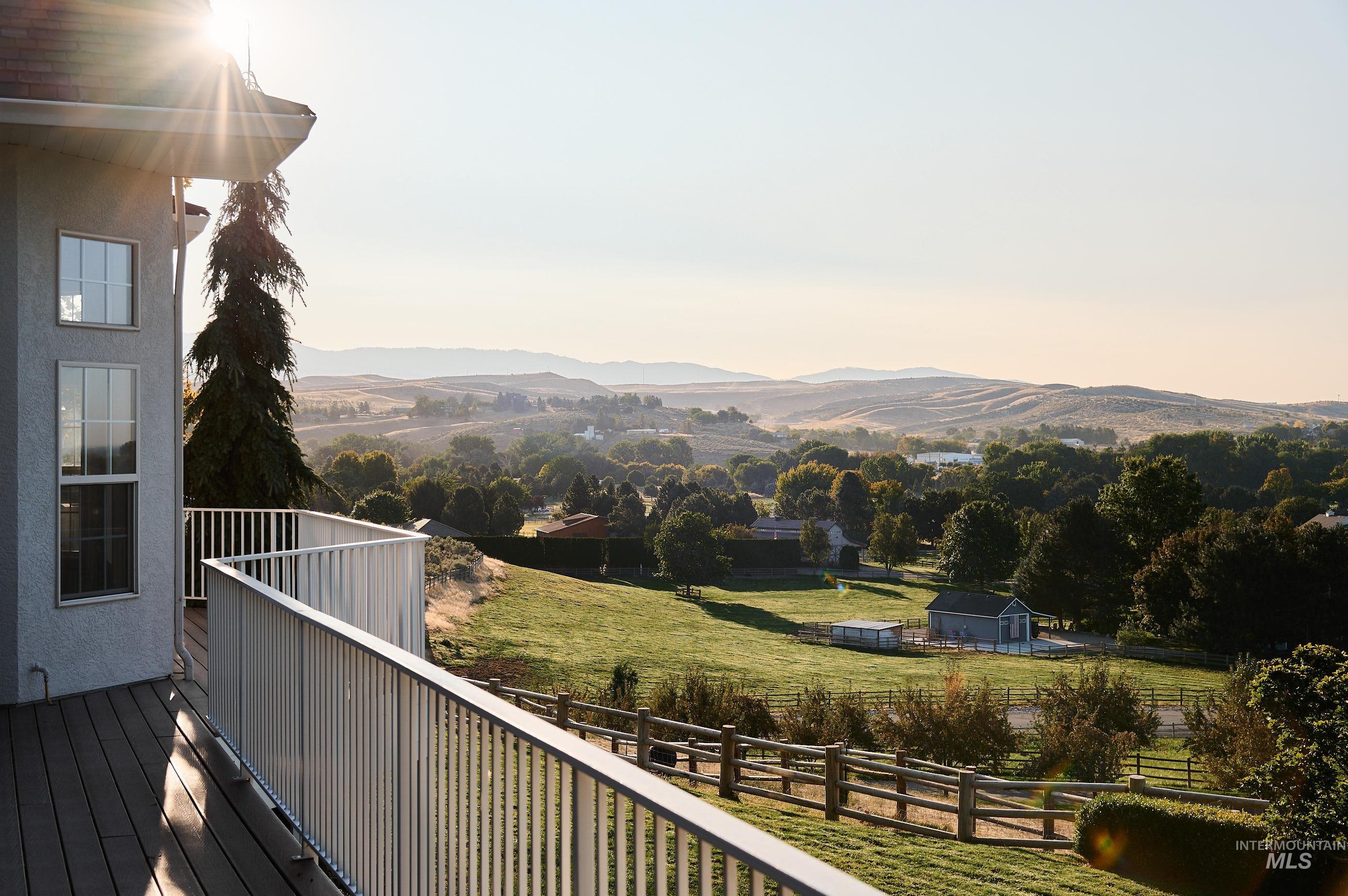 3931 North Triple Ridge Place Eagle, ID 83616 - Photo 30 of 45 View of mountain backdrop featuring a tree filled landscape