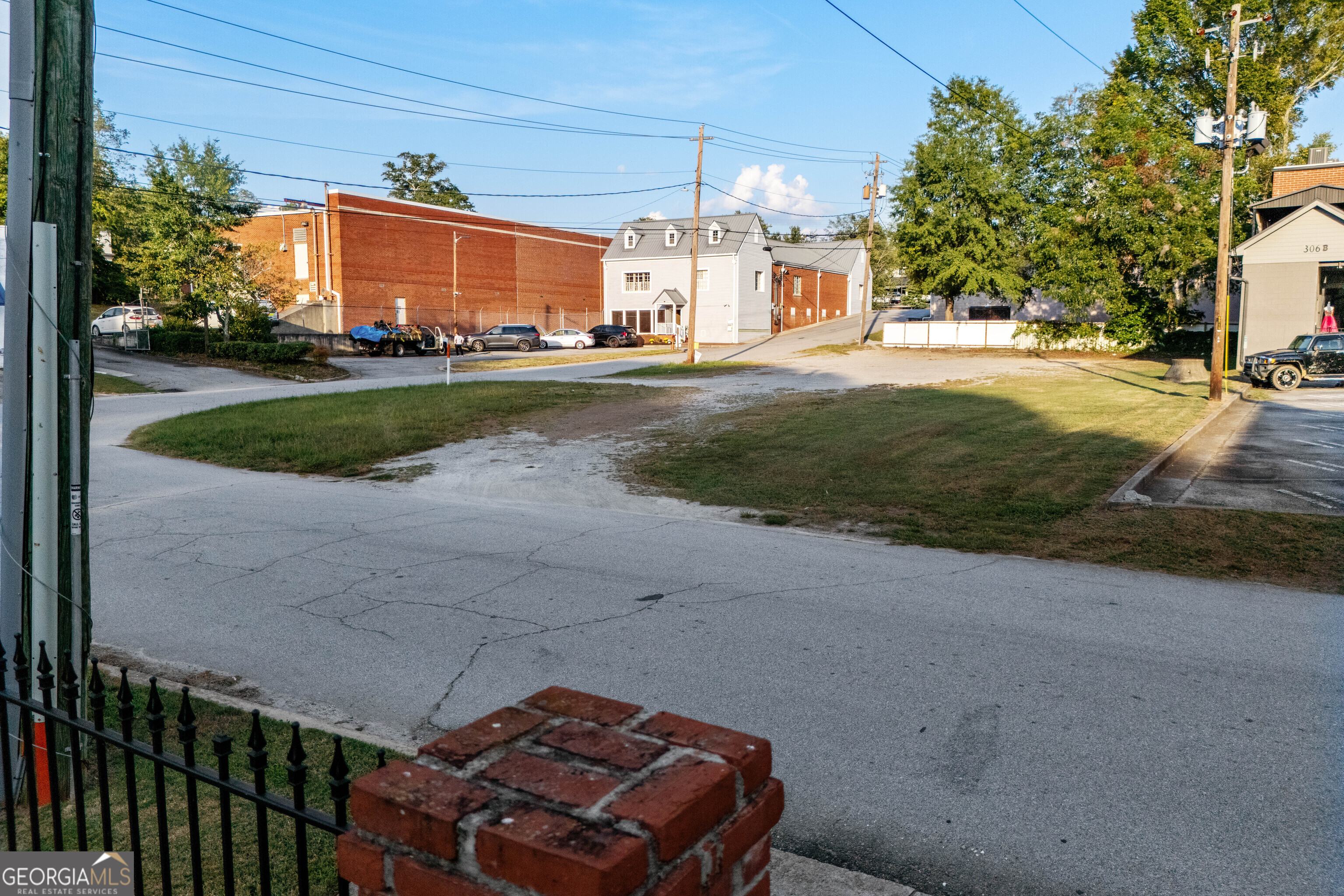 0 Ward Street Carrollton, GA 30117 - Photo 5 of 10 a view of a house with a yard next to a road