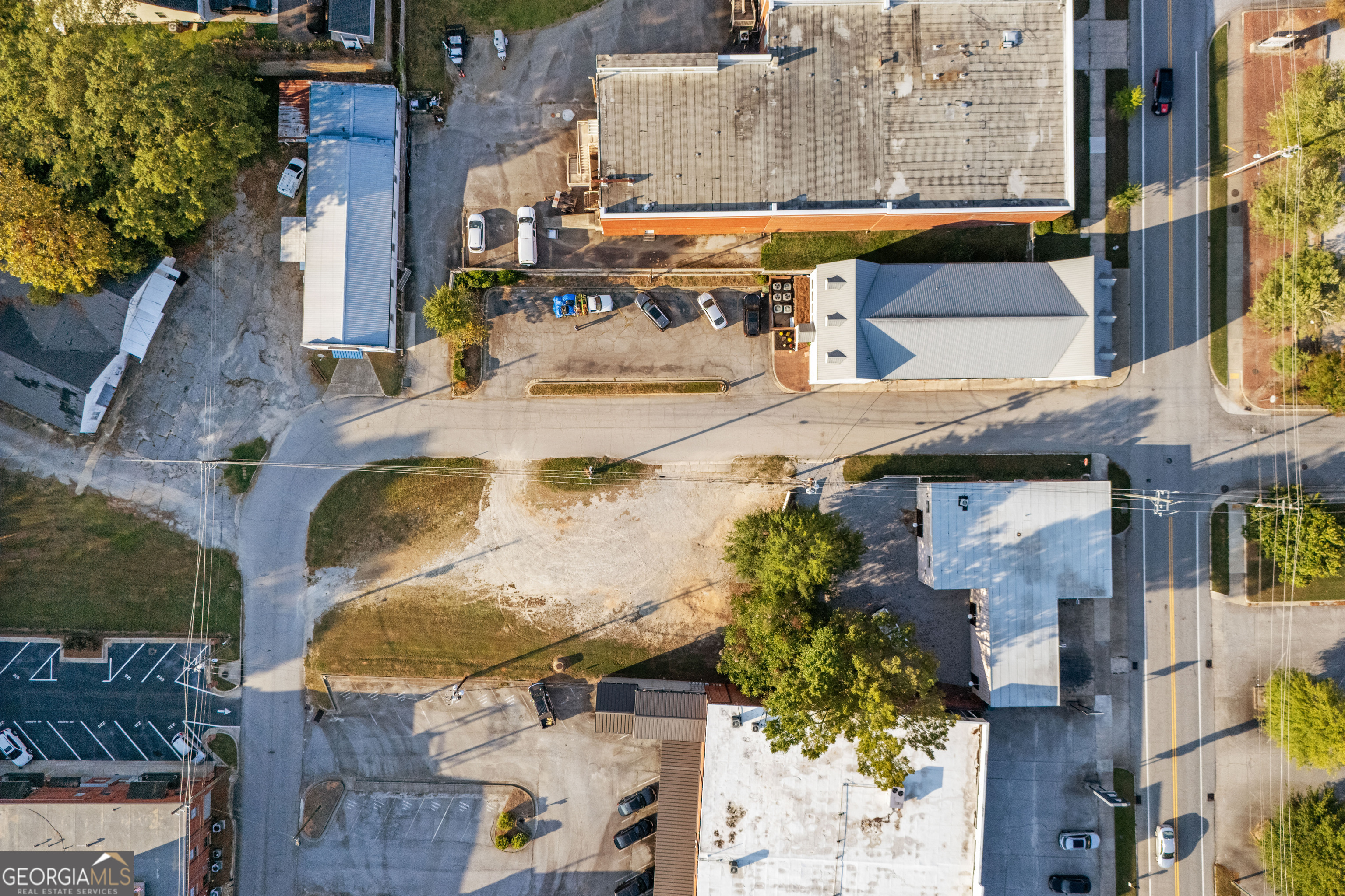 0 Ward Street Carrollton, GA 30117 - Photo 6 of 10 an aerial view of residential houses with outdoor space