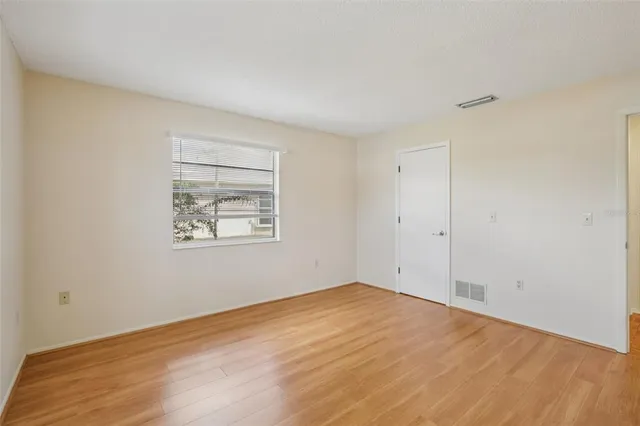 a utility room with closet dryer and washer