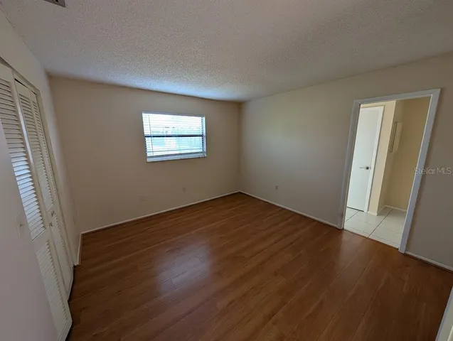 a bathroom with a shower and a toilet