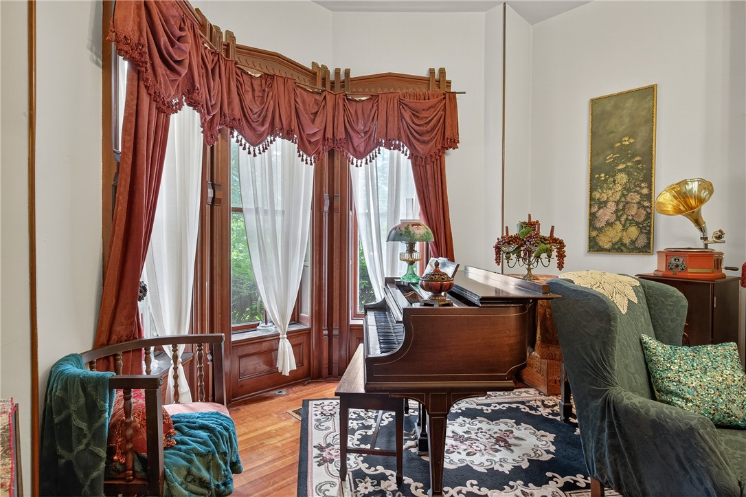51 Seneca Street Starkey, NY 14837 - Photo 10 of 41 front parlor, window treatments are included