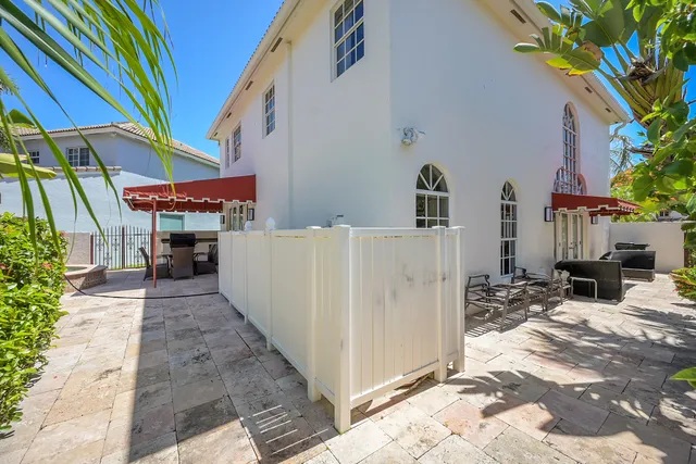 a view of walk in closet with window and sitting area