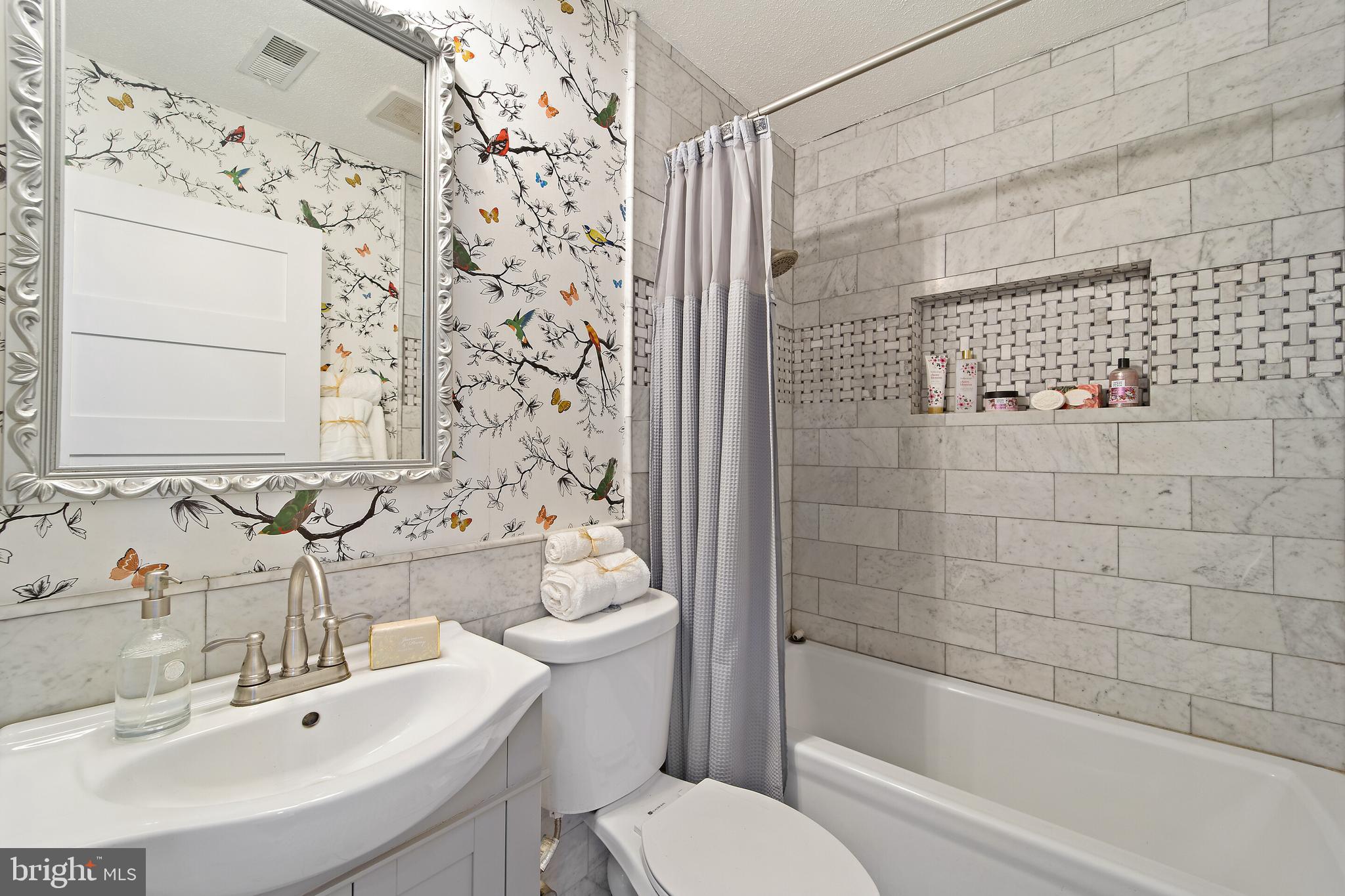 21860 Blue Ridge Mountain Road Paris, VA 20130 - Photo 37 of 66 Custom tile work in hall bath.