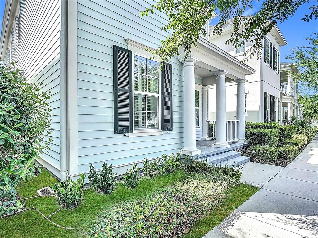 1513 Resolute Street Celebration, FL 34747 - Photo 6 of 43 front view of a house with a yard