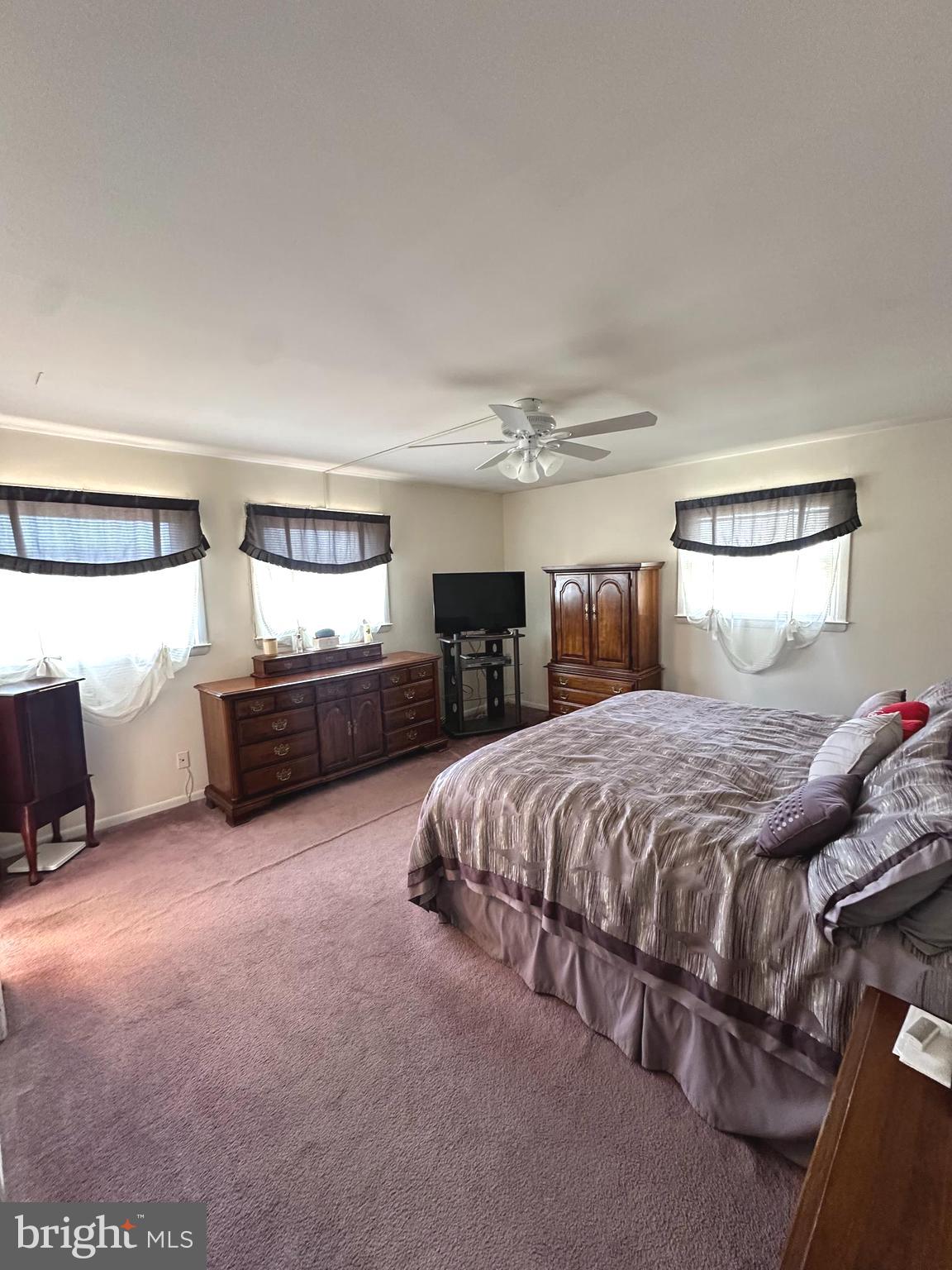 118 Spring House Road Cherry Hill, NJ 08002 - Photo 12 of 19 a spacious bedroom with a bed and dresser