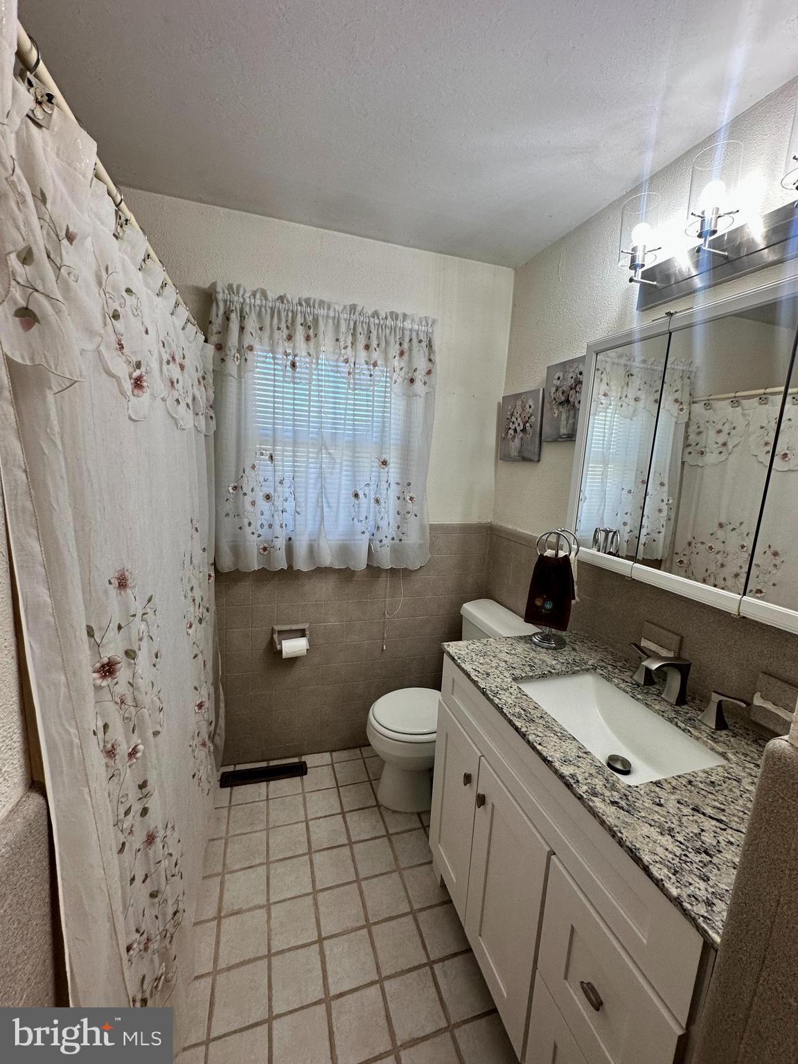 118 Spring House Road Cherry Hill, NJ 08002 - Photo 16 of 19 a bathroom with a granite countertop sink toilet and shower