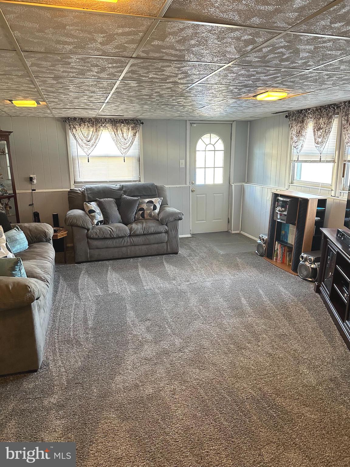 118 Spring House Road Cherry Hill, NJ 08002 - Photo 17 of 19 a living room with furniture and a large window
