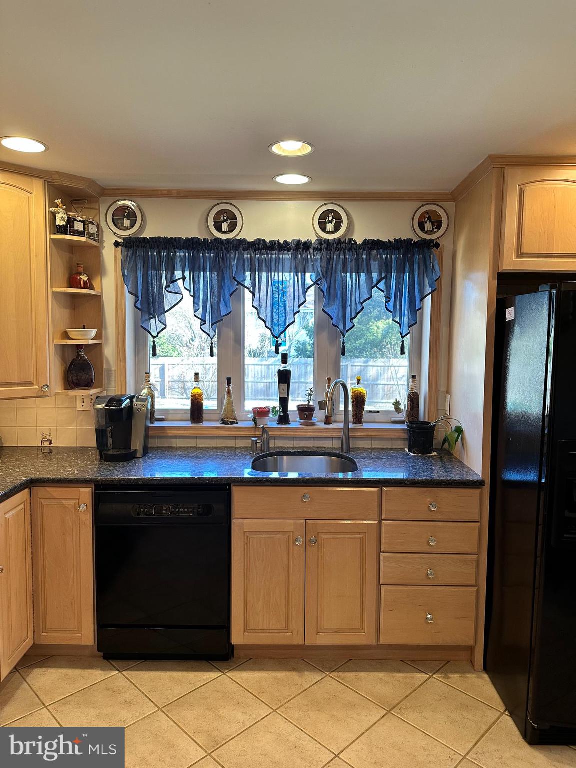 118 Spring House Road Cherry Hill, NJ 08002 - Photo 4 of 19 a kitchen with a sink and cabinets
